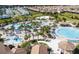 Large community pool with various water features at 1502 Moon Valley Dr, Davenport, FL 33896