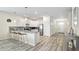 Modern kitchen with stainless steel appliances and granite countertops at 9098 Hazard St, Davenport, FL 33896