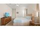 Comfortable bedroom featuring a king-size bed and ample space at 9098 Hazard St, Davenport, FL 33896