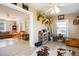Spacious room with mounted trophies, fishing rods, and a cowhide rug at 3198 Tohopekaliga Dr, Saint Cloud, FL 34772