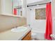 Bathroom with tub, shower, and a mosaic tile accent wall at 3198 Tohopekaliga Dr, Saint Cloud, FL 34772