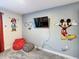 ' bedroom with fun decor and a beanbag chair at 580 Pebble Beach Dr, Davenport, FL 33896