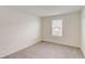 Bright bedroom with neutral carpet and a window with blinds at 1688 Tropical Palms Cir, Kissimmee, FL 34747