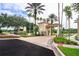 Gated community entrance with landscaping at 2605 Emerald Island Blvd, Kissimmee, FL 34747