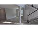 Bright study or office space with adjacent staircase at 3937 Reed Grass Pl, Kissimmee, FL 34746