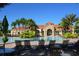 Resort-style pool with lounge chairs and a clubhouse at 3937 Reed Grass Pl, Kissimmee, FL 34746