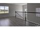 Spacious loft area with natural light and wood flooring at 3937 Reed Grass Pl, Kissimmee, FL 34746