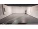 Spacious garage with epoxy floor and ample storage at 3937 Reed Grass Pl, Kissimmee, FL 34746