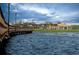 Wooden footbridge over lake to clubhouse at 3937 Reed Grass Pl, Kissimmee, FL 34746