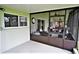Covered porch with access to a screened patio at 13900 Fox Glove St, Winter Garden, FL 34787