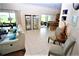 Bright living room with tile floors and access to a patio at 13900 Fox Glove St, Winter Garden, FL 34787