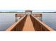 Wooden dock with gazebo overlooking the lake at 13900 Fox Glove St, Winter Garden, FL 34787
