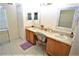 Bathroom with dual sinks, great for a busy morning routine at 13900 Fox Glove St, Winter Garden, FL 34787