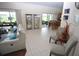 Bright living room with tile floors and access to a patio at 13900 Fox Glove St, Winter Garden, FL 34787