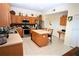 Spacious kitchen with island, stainless steel appliances, and ample cabinetry at 13900 Fox Glove St, Winter Garden, FL 34787