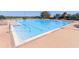 Inviting community pool with plenty of lounge chairs at 13900 Fox Glove St, Winter Garden, FL 34787