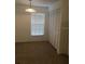 Bright dining area with window blinds and built-in storage at 600 Northern Way # 108, Winter Springs, FL 32708