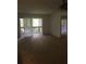 Spacious living room with carpet, sliding doors to balcony at 600 Northern Way # 108, Winter Springs, FL 32708
