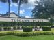 Tuscany Place community entrance with landscaping at 600 Northern Way # 108, Winter Springs, FL 32708