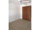 Simple bedroom with wood closet doors and carpet at 600 Northern Way # 108, Winter Springs, FL 32708