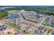 Aerial view showing home's location in Island Village with clubhouse and pool at 7401 Levee Ln, Celebration, FL 34747
