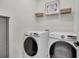 Convenient laundry room with washer and dryer at 7401 Levee Ln, Celebration, FL 34747