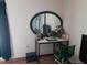 Well-lit vanity area with a large mirror and seating at 924 Derbyshire Dr, Kissimmee, FL 34758