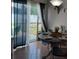 Dining area with round table and access to backyard at 924 Derbyshire Dr, Kissimmee, FL 34758
