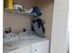 Laundry room with washer, dryer, and additional storage at 924 Derbyshire Dr, Kissimmee, FL 34758