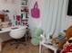 Bright vanity area with a mirror and chair at 924 Derbyshire Dr, Kissimmee, FL 34758