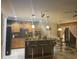 Spacious kitchen with island and modern appliances at 662 Rosselli Blvd, Davenport, FL 33896