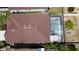 Aerial view showing house, pool, and backyard at 662 Rosselli Blvd, Davenport, FL 33896