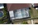 Overhead view of refreshing pool and patio area at 662 Rosselli Blvd, Davenport, FL 33896