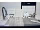 Display of kitchen design options, including flooring and countertops at 3860 Bannock Ave, Tavares, FL 32778