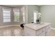 Eat-in kitchen with breakfast nook and view to backyard at 6943 Cupseed Ln, Harmony, FL 34773