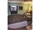 Bedroom with double bed and dresser at 6936 Wilson Ave, Mulberry, FL 33860