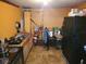 Small kitchen with stove, sink, and refrigerator at 6936 Wilson Ave, Mulberry, FL 33860