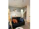 Living room with comfortable seating and a view of the dining area at 718 Verona Ave, Davenport, FL 33897