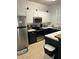 Modern kitchen featuring stainless steel appliances at 718 Verona Ave, Davenport, FL 33897