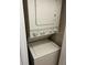 Convenient laundry closet with stackable washer and dryer at 718 Verona Ave, Davenport, FL 33897