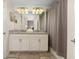 Clean bathroom with double vanity and shower/tub combo at 3148 Pequod Pl, Kissimmee, FL 34746