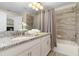 Modern bathroom with double vanity and shower at 3148 Pequod Pl, Kissimmee, FL 34746