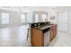 Open kitchen with granite island, stainless steel dishwasher, and breakfast bar at 1134 Tapestry Dr, Celebration, FL 34747