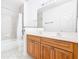 Bathroom with double vanity, tub, and shower at 1134 Tapestry Dr, Celebration, FL 34747