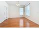 Bright and airy dining room with hardwood floors and a chandelier at 1134 Tapestry Dr, Celebration, FL 34747