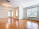 Hardwood floors and neutral walls create a bright and airy living room at 1134 Tapestry Dr, Celebration, FL 34747