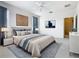 Main bedroom with plush bed, ample natural light and stylish decor at 1134 Tapestry Dr, Celebration, FL 34747