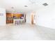 Kitchen boasts wood cabinets, a breakfast bar, and tile flooring at 1134 Tapestry Dr, Celebration, FL 34747