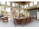 Outdoor grilling area with large table and seating at 1134 Tapestry Dr, Celebration, FL 34747