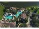 Resort-style pool with multiple areas, including a lap pool and a water slide at 3857 Carrick Bend Dr, Kissimmee, FL 34746